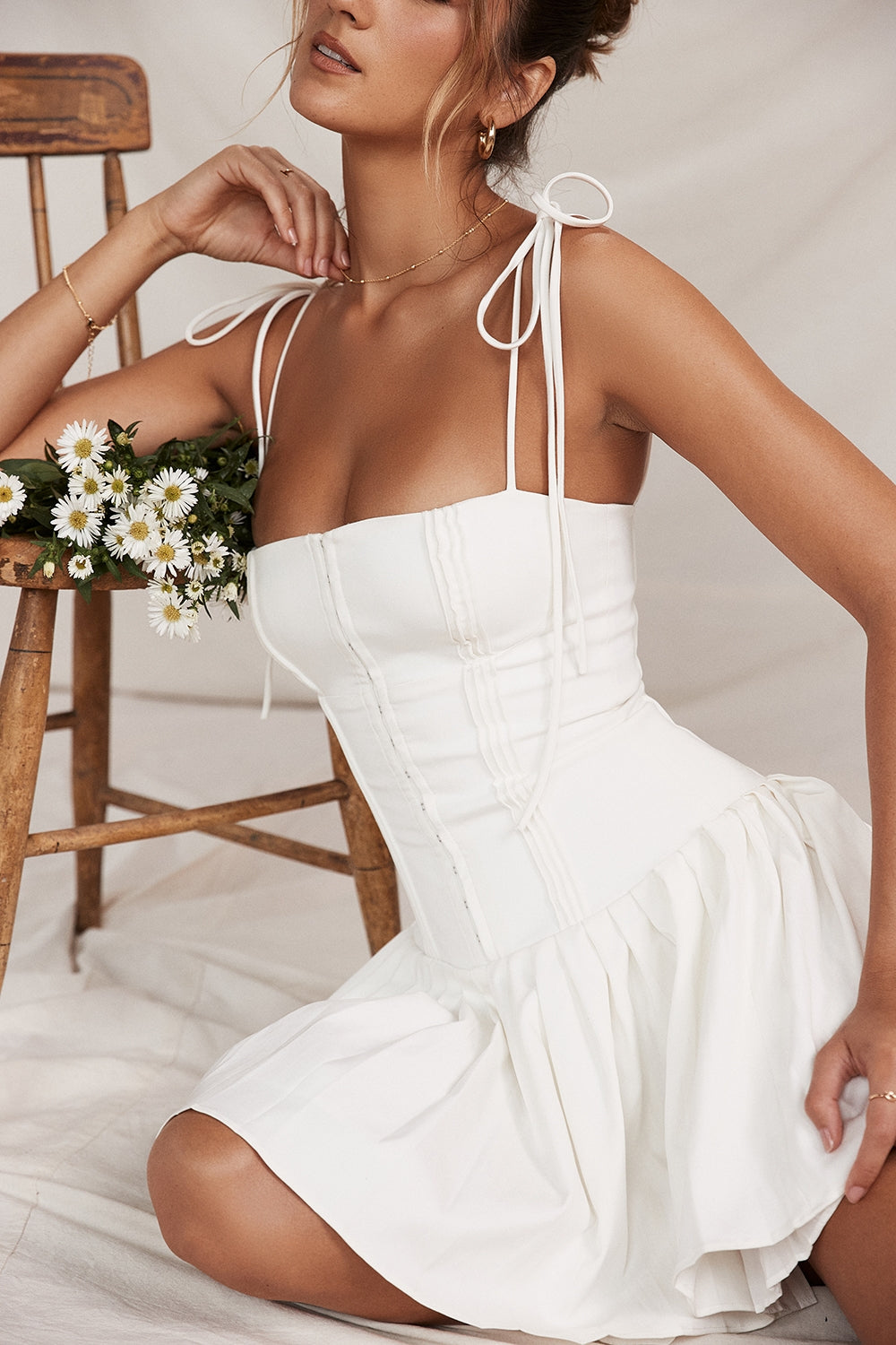 white pleated mini dress